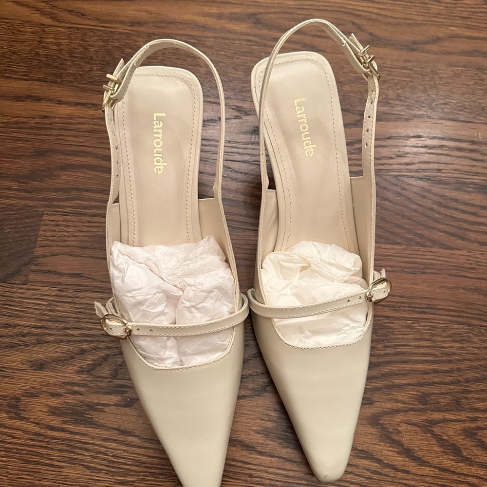 Larroude Cream Heels with Elegant Bow and Transparent Slingback